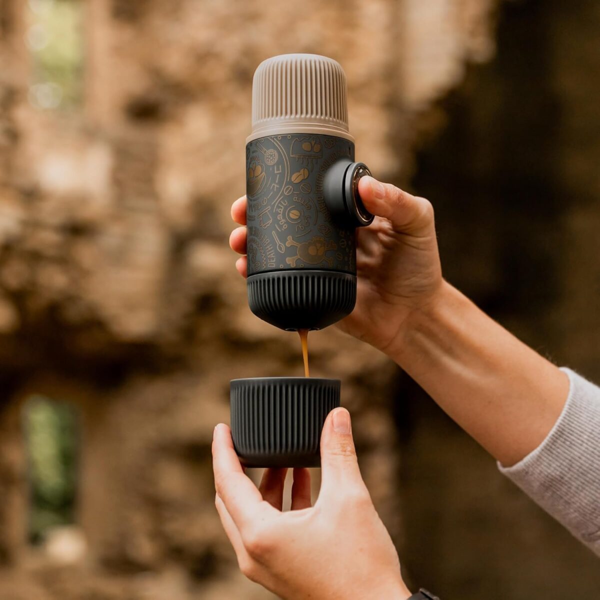 The WACACO Nanopresso Dark Souls is a premium, manually powered portable espresso maker that allows you to enjoy espresso wherever you are. Featuring an eye-catching dark aesthetic, this compact device delivers rich, flavorful espresso with ease, all without the need for electricity or batteries. The included protective case ensures your Nanopresso stays safe and secure during travel, making it the perfect companion for coffee lovers on the go. Wacaco Nanopresso Dark Souls Espresso Maker with Protective Case