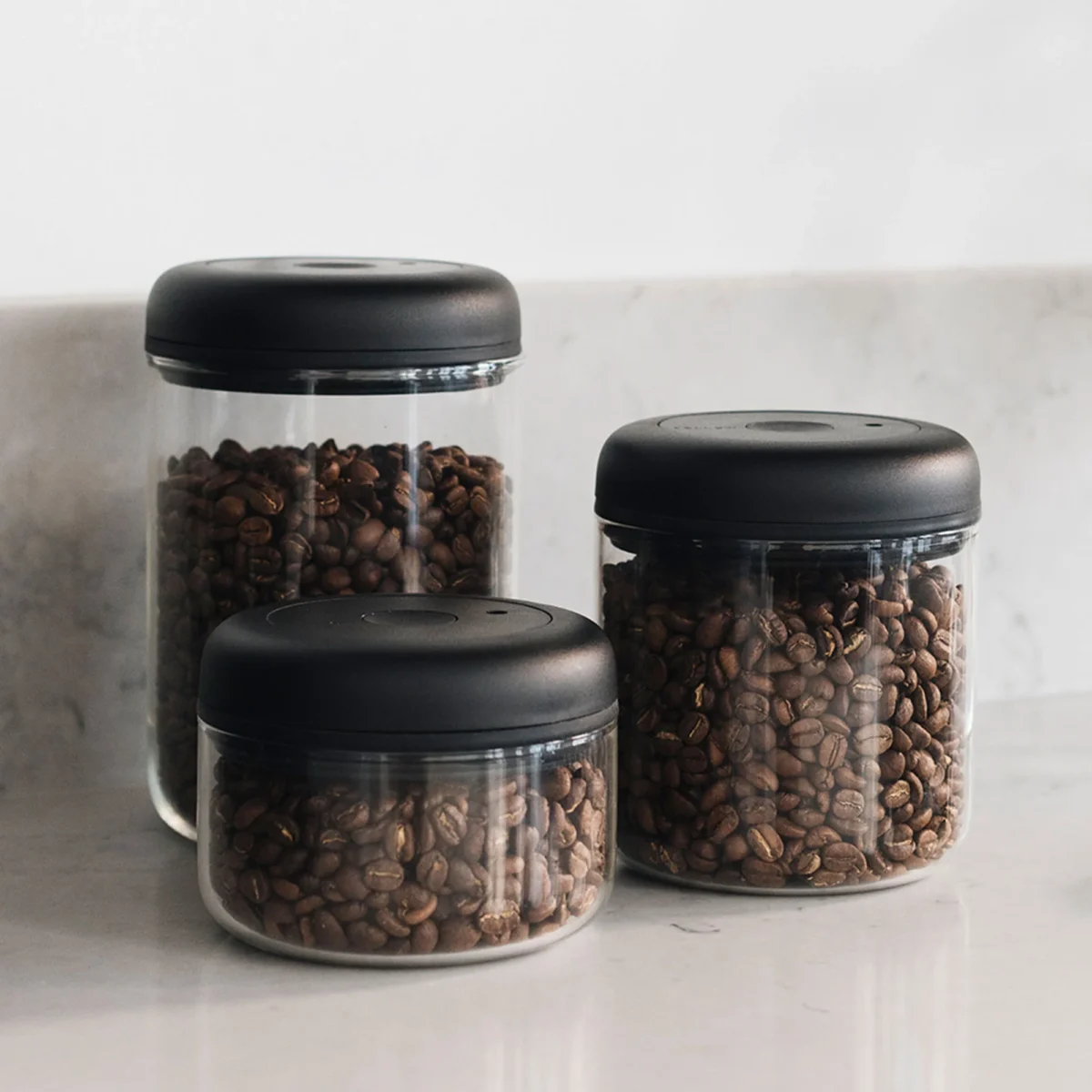 <h3 data-start="120" data-end="149"><strong data-start="124" data-end="147">Product Description</strong></h3> <p data-start="150" data-end="568">The <strong data-start="154" data-end="179">Atmos Vacuum Canister</strong> is the ultimate solution for keeping coffee beans and other food items fresh for longer. Designed with an <strong data-start="286" data-end="312">integrated vacuum pump</strong>, it removes air to <strong data-start="332" data-end="353">prevent oxidation</strong>, preserving flavors and extending shelf life by up to <strong data-start="408" data-end="422">50% longer</strong>. Available in <strong data-start="437" data-end="461">manual twist-to-lock</strong> and <strong data-start="466" data-end="490">electric push-button</strong> options, Atmos ensures your coffee stays as fresh as the day you bought it.</p> Fellow Atmos Vacuum Canister for Coffee